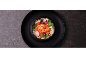 Cold Smoked Gin and Myer Lemon king salmon with a Goats cheese Cloud, Lemon Verbena and pistachio