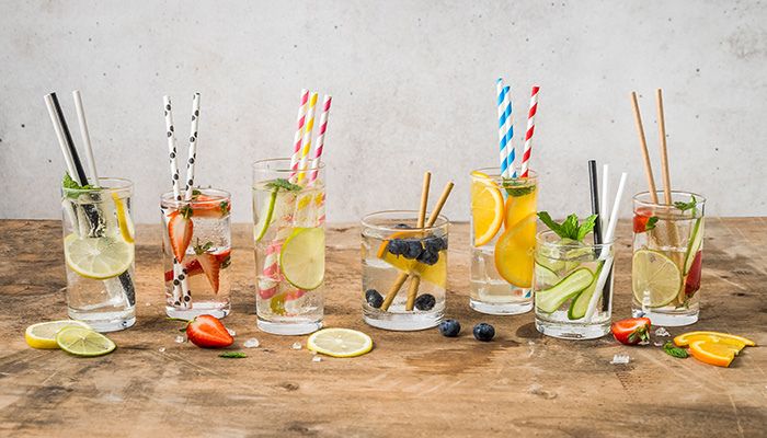 Paper straw in glass of drink